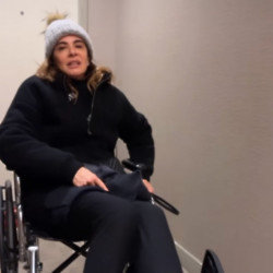 Luciana Gimenez is using a wheelchair to get around after breaking her leg in a skiing accident
