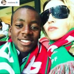 Madonna and David at the Portugal match (c) Madonna/Instagram