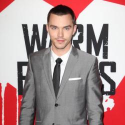 Nicholas Hoult looked dapper in a grey suit