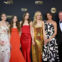 Nicole Kidman (third left) got to share the red carpet with her family as she accepted a prestigious award