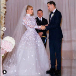Paris Hilton in the first of six wedding gowns