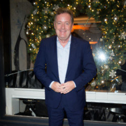 A suspect has been arrested for making death threats against Piers Morgan
