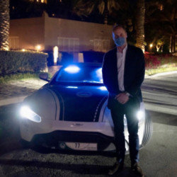 Prince William poses with police car in Dubai
