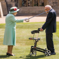 Queen Elizabeth II knighting Captain Sir Tom Moore