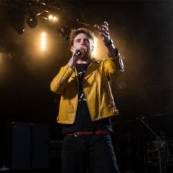Ricky Wilson of the Kaiser Chiefs on stage at Cornbury Festival