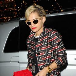Rita Ora carries her red Lego Chanel clutch
