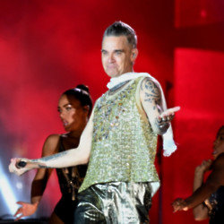 Robbie Williams brought out Mark Owen for 'Greatest Day'