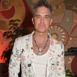 Robbie Williams' dad is recovering after his fall