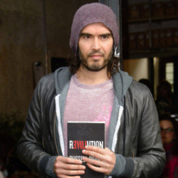 Russell Brand has been defended by his dad