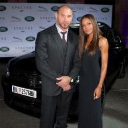 SPECTRE cast members David Bautista and Naomie Harris are reunited with Jaguar and Land Rover stunt vehicles from the film ahead of their internationa