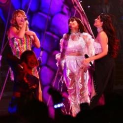 Charli XCX on stage with Taylor Swift