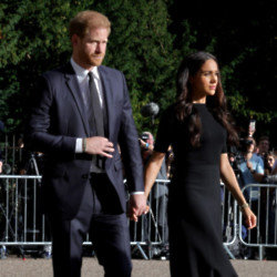 The Duke and Duchess of Sussex reportedly joined senior royals as they united in grief around Queen Elizabeth’s coffin at Buckingham Palace