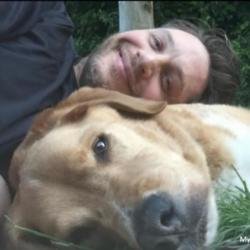 Tom Hardy and pet dog Woody (c) YouTube 