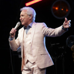 Tony Christie first saw his now-wife when she was in the frotn row at one of his concerts