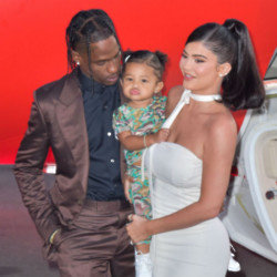 Travis Scott, Kylie Jenner, and their daughter Stormi