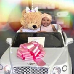 True Thompson in her toy Bentley (Instagram)