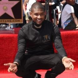 Usher accepts his star on the Hollywood Walk of Fame