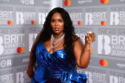 Lizzo slams body shamers as she reveals workout routine
