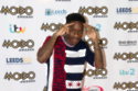 Tinchy Stryder calls on wider music industry to drop the term ‘urban’