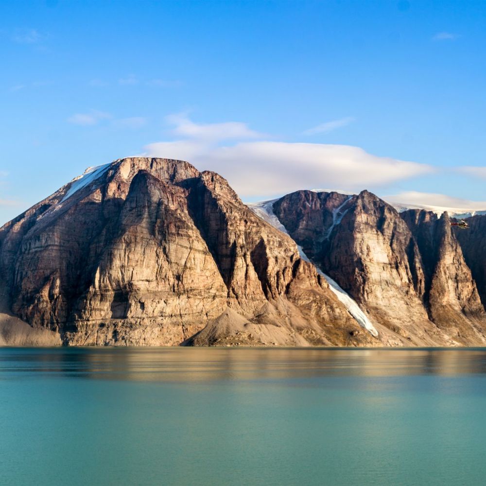 Panoramic view of the cliffs and mountains in Buchan Gulf, Baffin Island, Canada (iStock/PA)