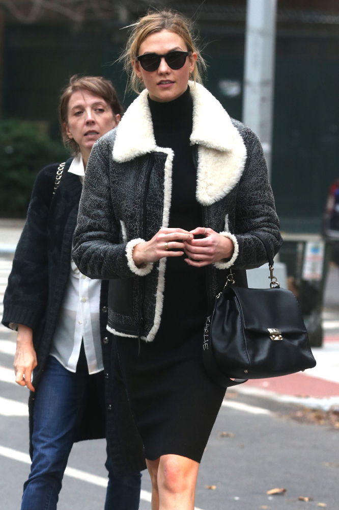 Karlie Kloss modelling Coach’s painted shearling B3 bomber jacket