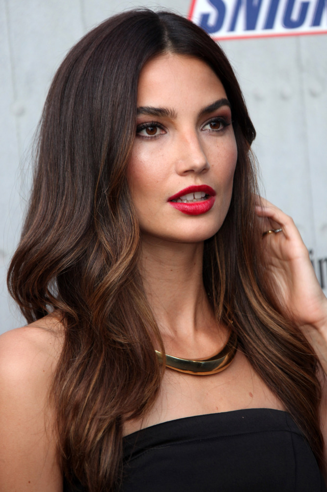 Lily Aldridge makes a statement with a bold red pout
