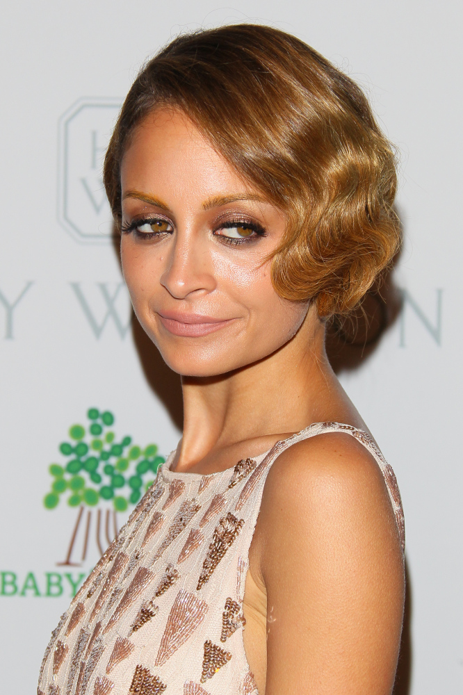 Nicole Richie tries out the hairstyle on the red carpet
