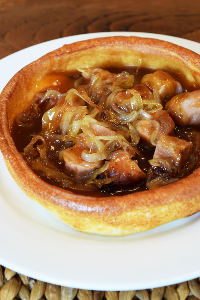 Caramerlised Onion & Cumberland Sausages In A Giant Yorkshire Pud