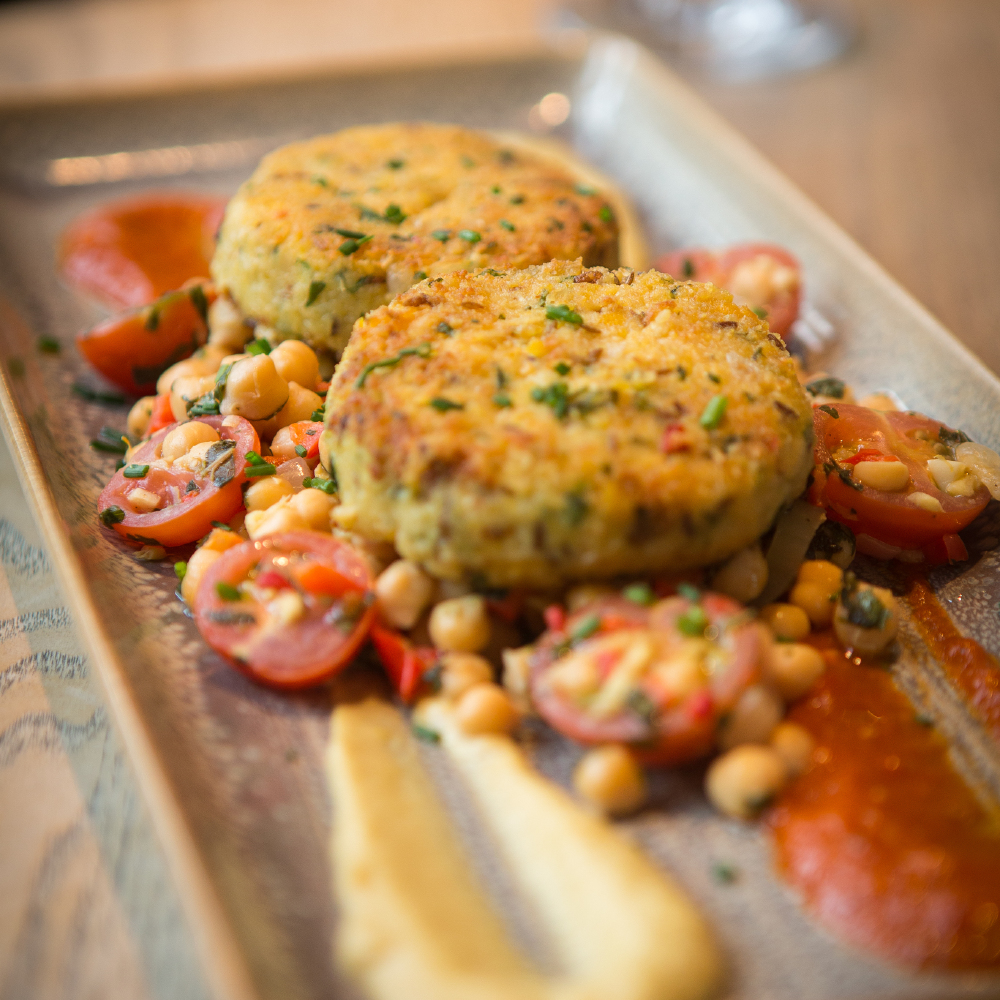 Chickpea and coriander cakes with tomato sauce and aubergine caviar