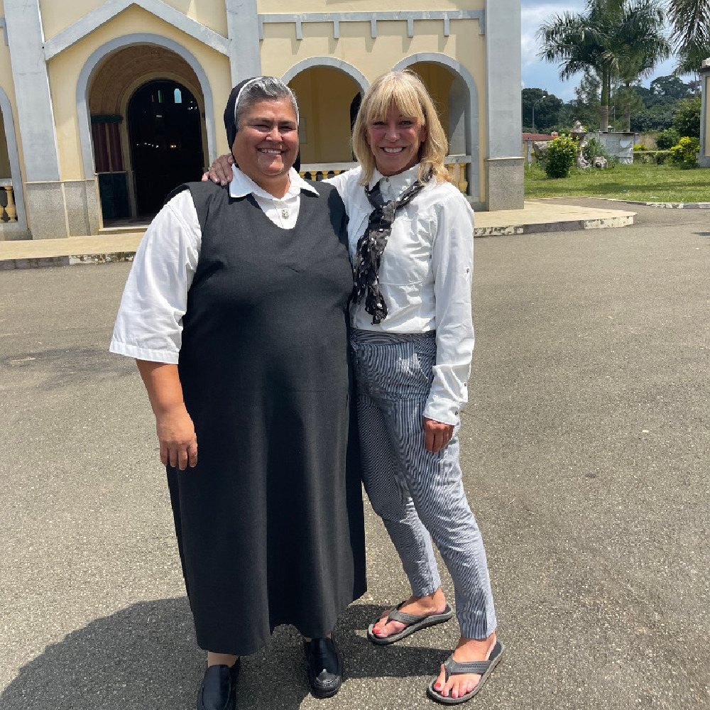 Making friends on a Sunday in Equatorial Guinea — Ayene. Franci and a Dominican nun, outside of a church service.