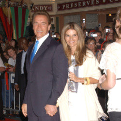 Arnold Schwarzenegger and Maria Shriver (Credit: Famous)