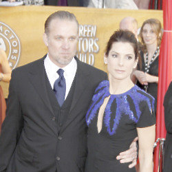 Jesse James and Sandra Bullock (Credit: Famous)