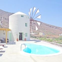 Green windmill villa in Santorini