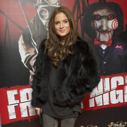 Binky Felstead adds glamour to her look with a faux fur jacket