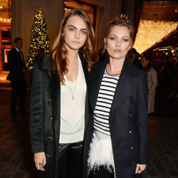 Cara Delevingne and Kate Moss at the Burberry Christmas windows launch
