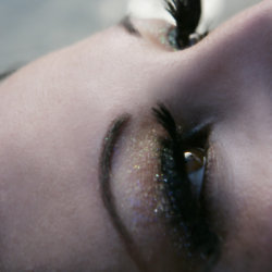 Use glitter to give a subtle glint to the eye