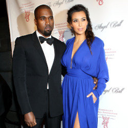 What kind of gown will Kim Kardashian wear when she marries Kanye West?