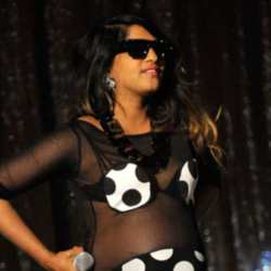 M.I.A on stage in the House of Holland dress
