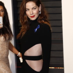 Michelle Monaghan wears a cut away dress at the Oscars after party