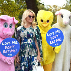Pamela Anderson promoting vegansim with giant animal mascots today