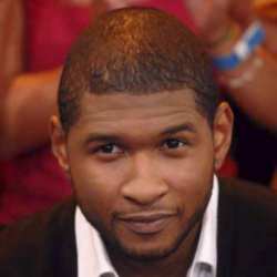Usher denies rift with wife, Tameka Foster