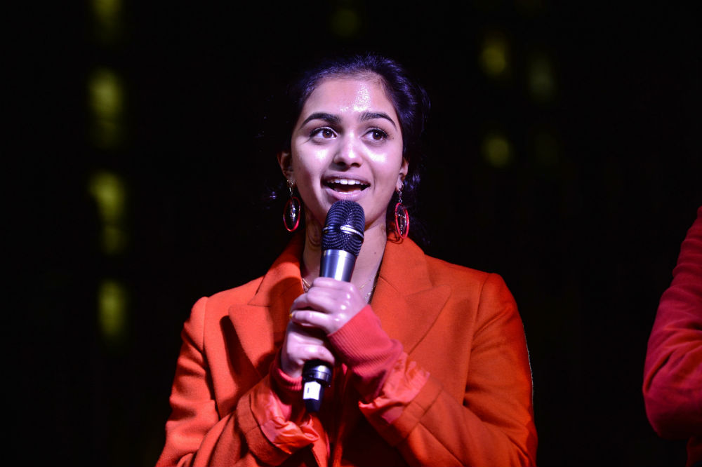 Amika George at 18, speaking during a period poverty protest opposite Downing Street in December 2017 / Photo Credit: Victoria Jones/PA Archive/PA Images