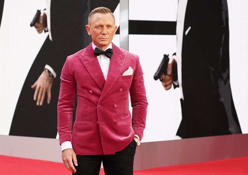 Daniel Craig smoulders in pink at the No Time To Die world premiere at the Royal Albert Hall in London, September 2021 / Picture Credit: Jonathan Brady/PA Wire/PA Images