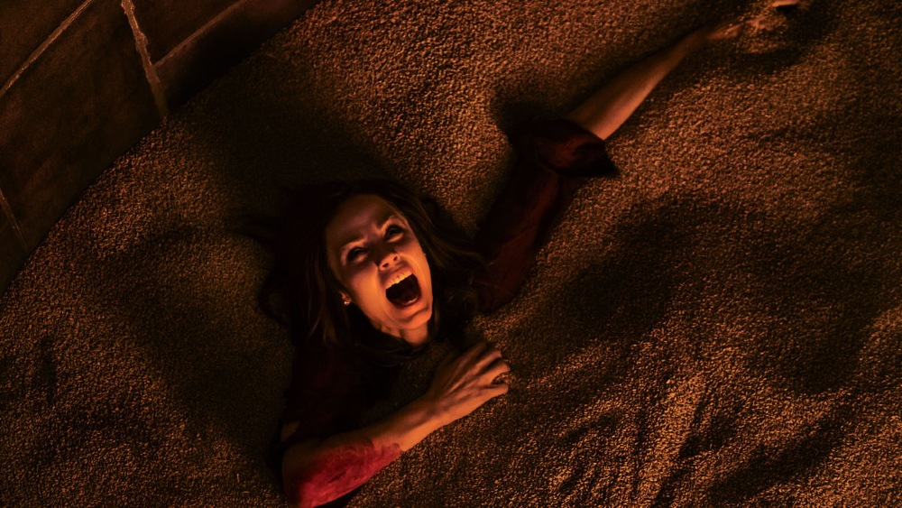 Anna finds herself buried in the grain silo / Picture Credit: Lionsgate Films