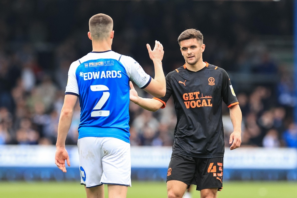 Jake Daniels (right) plays for Blackpool and signed a contract to go pro in February 2022 / Picture Credit: News Images/Alamy Stock Photo