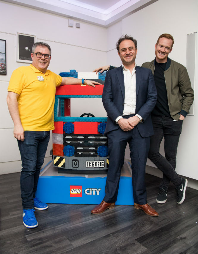 Dr. Sam Wass, Greg Rutherford and LEGO Certified Professional Kevin Hall at the LEGO City Hero Academy, an event held at the London Transport Museum
