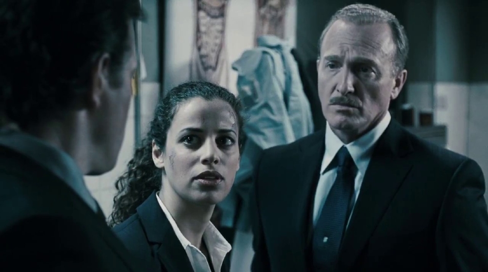 Special Agents Erickson and Perez close in on Detective Hoffman / Picture Credit: Lionsgate Films