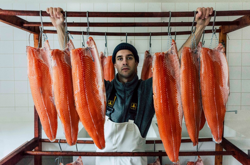 Vincenzo Gentile works as part of the salmon smoking industry