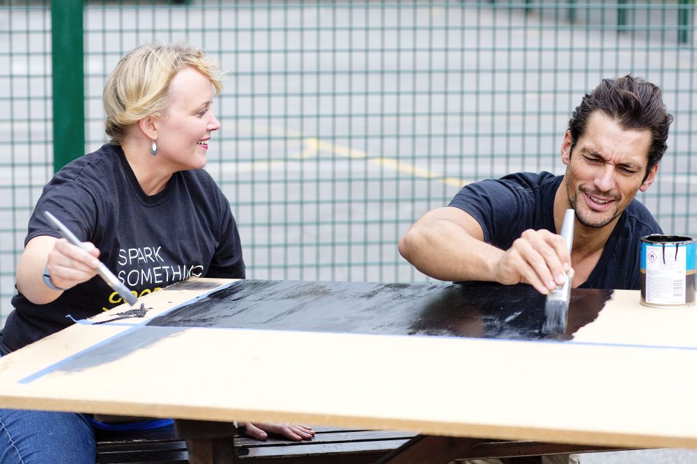LONDON, ENGLAND – JULY 30TH: David Gandy picks up a paintbrush and gets involved with the transformation in place at a school in London as part of Spark Something Good, a new M&S initiative that will see 24 projects in the capital be transformed in just 24 hours to inspire the nation to donate their time to local communities (Photo by David Bebber / REX Features)