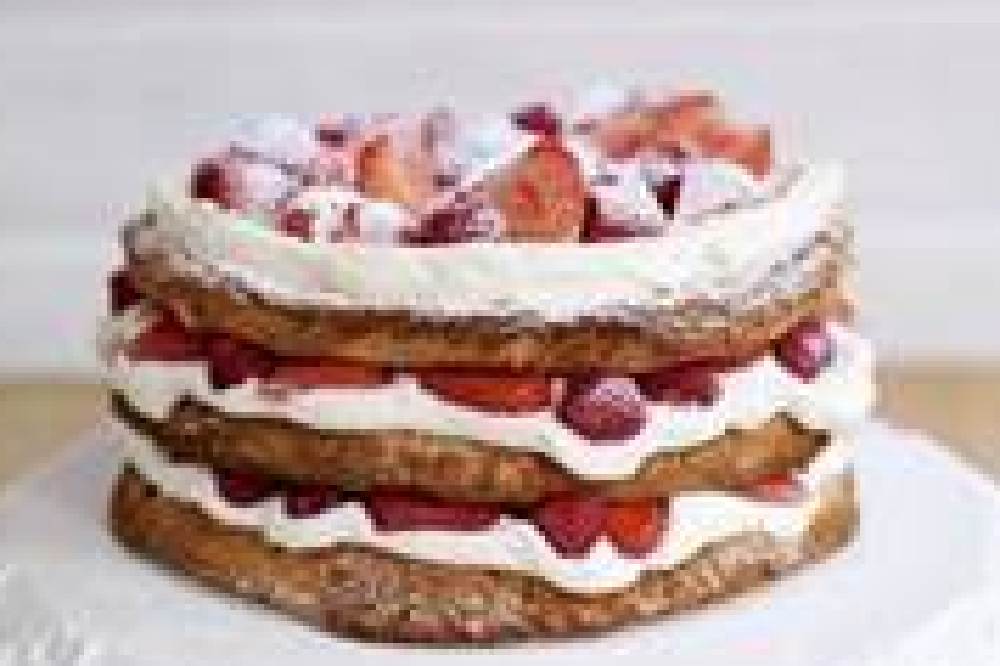 Sophie Michell’s Hazelnut Meringue Layer Cake with Sweet Eve Strawberries and Raspberries